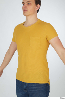 Brett casual dressed upper body yellow t shirt 0002.jpg